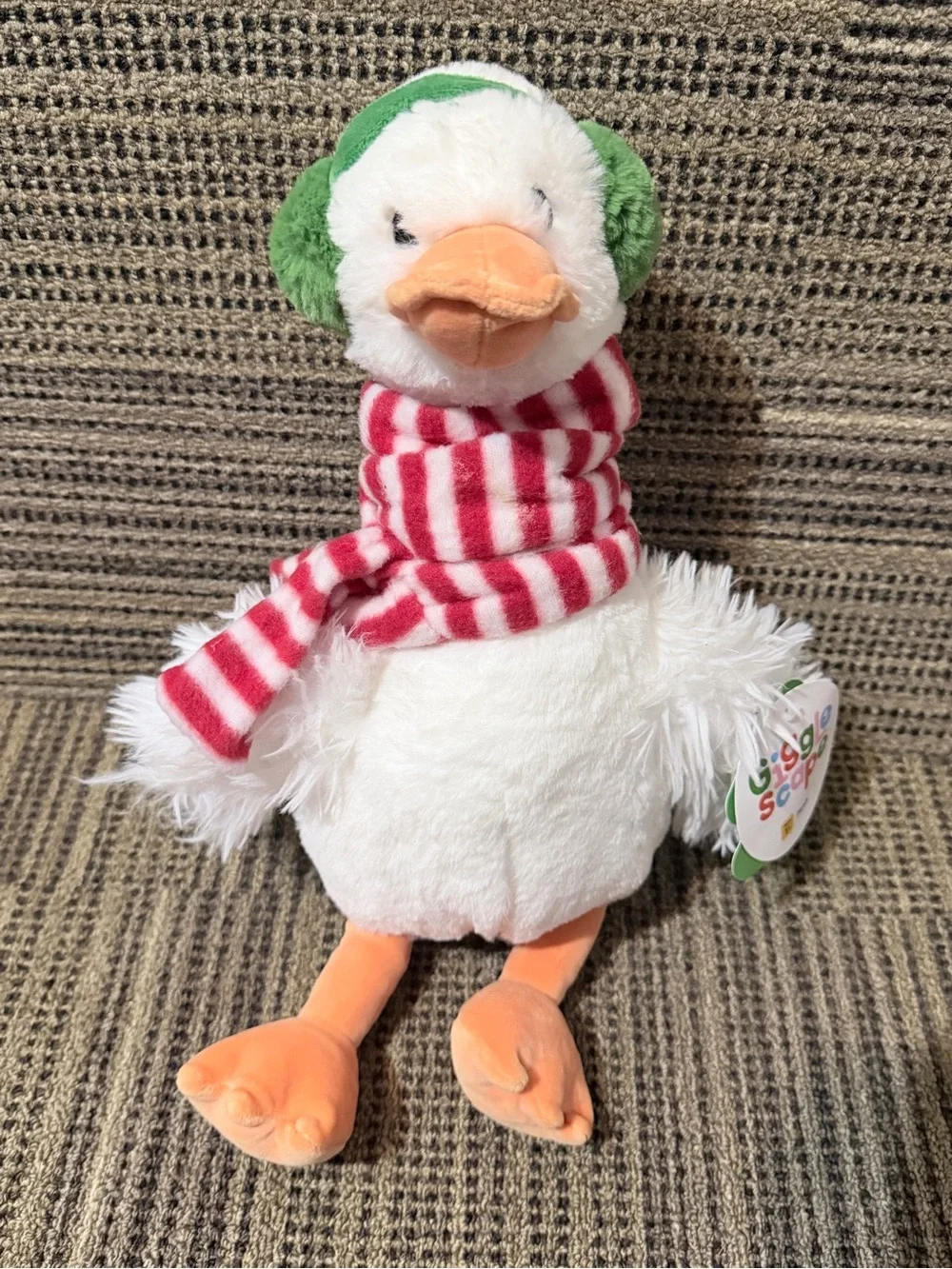 Plush White Duck Toy with Green Earmuffs and Red Striped Scarf